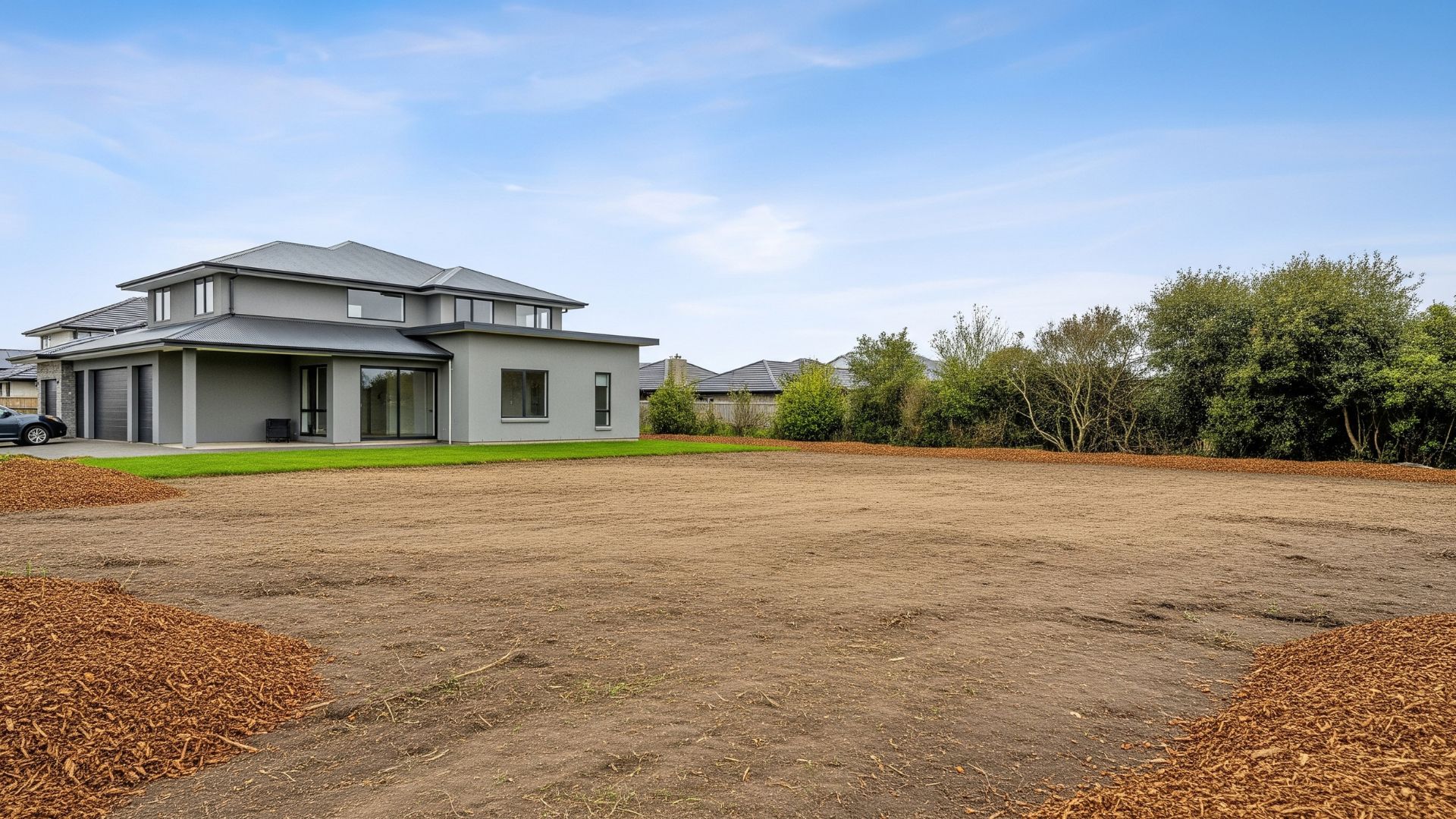 Land cleared in the backyard of a home